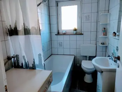 Ein Badezimmer in der Unterkunft Geesthaus