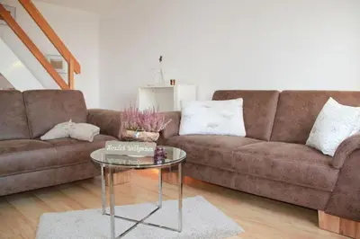 Ein Sitzbereich in der Unterkunft Ferienhof Schoof No3