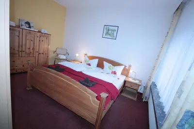 Ein Bett oder Betten in einem Zimmer der Unterkunft Haus Westerstraße Westerstr 16 Wohnung 3