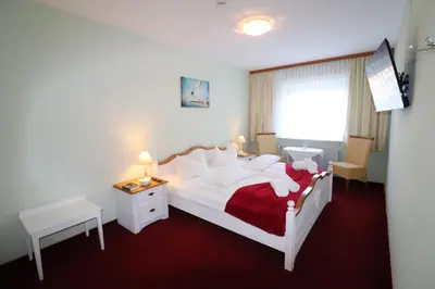 Ein Bett oder Betten in einem Zimmer der Unterkunft Haus Övern Diek Wohnung 1