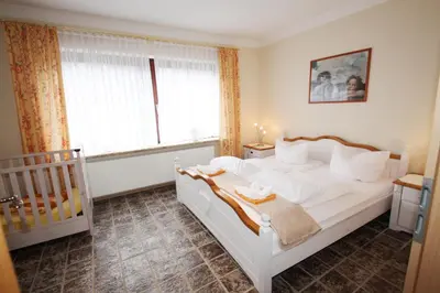 Ein Bett oder Betten in einem Zimmer der Unterkunft Haus Övern Diek Wohnung 8