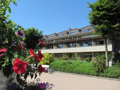 Ein Garten an der Unterkunft Haus am Kurpark Wohnung 26
