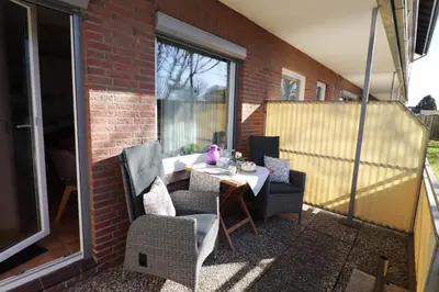 Ein Sitzbereich in der Unterkunft Haus am Kurpark Wohnung 2