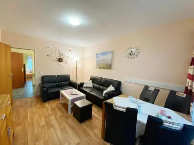 Ein Sitzbereich in der Unterkunft Haus am Kurpark Wohnung 4