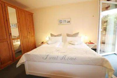 Ein Bett oder Betten in einem Zimmer der Unterkunft Haus am Kurpark Wohnung 7