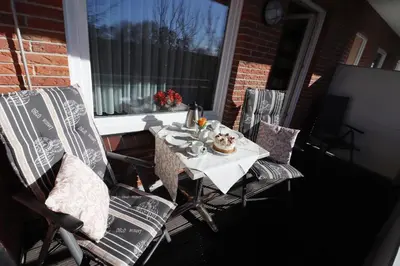 Ein Sitzbereich in der Unterkunft Haus am Kurpark Wohnung 11