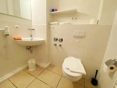 Ein Badezimmer in der Unterkunft Haus am Kurpark Wohnung 13