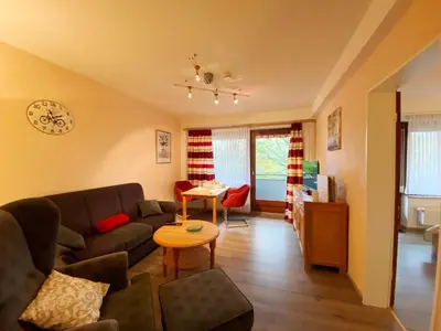 Ein Sitzbereich in der Unterkunft Haus am Kurpark Wohnung 14