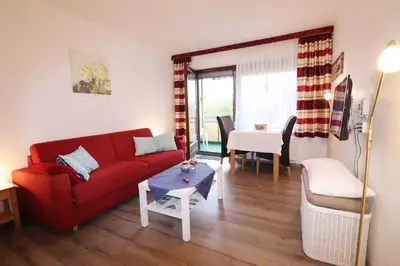 Ein Sitzbereich in der Unterkunft Haus am Kurpark Wohnung 16