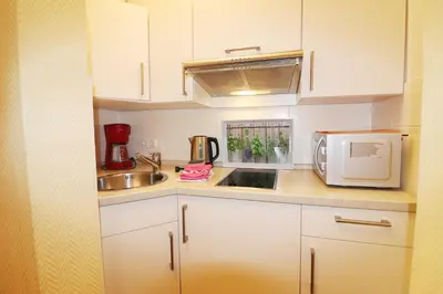 Küche/Küchenzeile in der Unterkunft Haus am Kurpark Wohnung 16