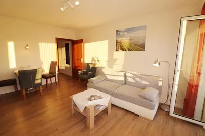 Ein Sitzbereich in der Unterkunft Haus Laura Wohnung 4