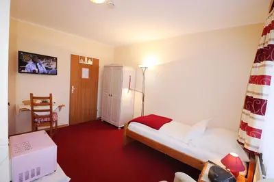 Ein Bett oder Betten in einem Zimmer der Unterkunft Haus am Kurpark Wohnung 17