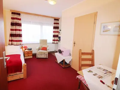 Ein Bett oder Betten in einem Zimmer der Unterkunft Haus am Kurpark Wohnung 17
