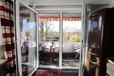 Ein Sitzbereich in der Unterkunft Haus am Kurpark Wohnung 18
