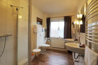 Ein Badezimmer in der Unterkunft Haus am Kurpark Wohnung 18