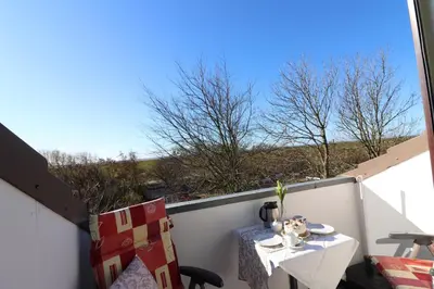 Ein Balkon oder eine Terrasse in der Unterkunft Haus am Kurpark Wohnung 21