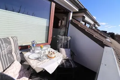 Ein Balkon oder eine Terrasse in der Unterkunft Haus am Kurpark Wohnung 24