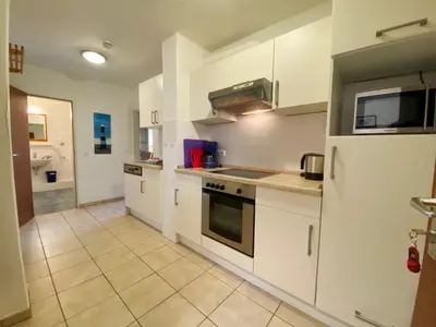 Küche/Küchenzeile in der Unterkunft Haus am Kurpark Wohnung 25