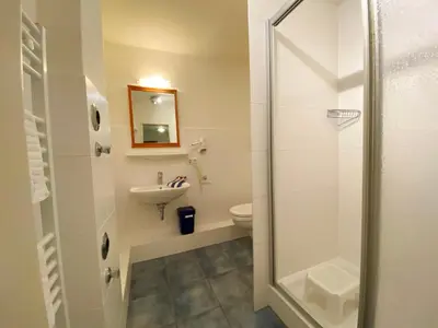 Ein Badezimmer in der Unterkunft Haus am Kurpark Wohnung 25