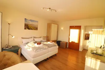 Ein Bett oder Betten in einem Zimmer der Unterkunft Haus Laura Wohnung 3