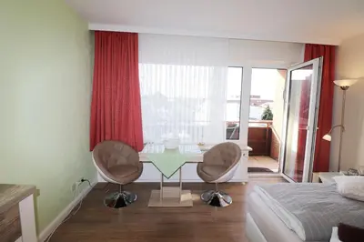 Ein Sitzbereich in der Unterkunft Haus Laura Wohnung 3