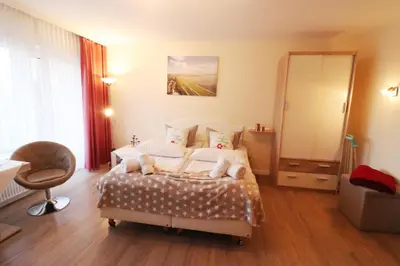 Ein Bett oder Betten in einem Zimmer der Unterkunft Haus Laura Wohnung 1