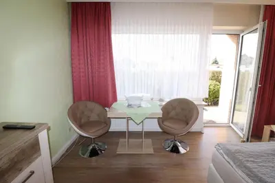 Ein Sitzbereich in der Unterkunft Haus Laura Wohnung 1