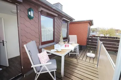 Ein Balkon oder eine Terrasse in der Unterkunft Am Oland 13 vorne