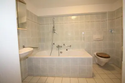 Ein Badezimmer in der Unterkunft Am Oland 13 vorne
