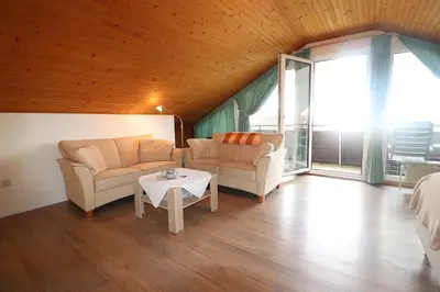 Ein Sitzbereich in der Unterkunft Haus Laura Wohnung 5