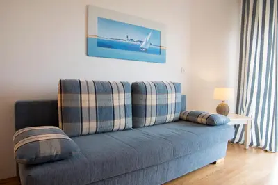Ein Sitzbereich in der Unterkunft Strand Palais 11