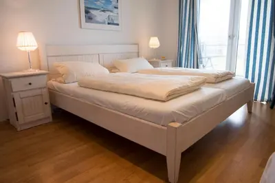 Ein Bett oder Betten in einem Zimmer der Unterkunft Strand Palais 11