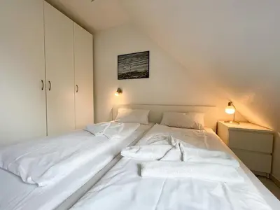Ein Bett oder Betten in einem Zimmer der Unterkunft Ferienwohnung Jonathan