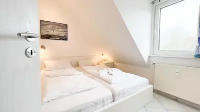 Ein Bett oder Betten in einem Zimmer der Unterkunft Ferienwohnung Jonathan