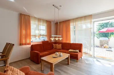 Ein Sitzbereich in der Unterkunft Haus Weser, Whg 2