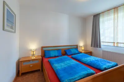 Ein Bett oder Betten in einem Zimmer der Unterkunft Haus Weser, Whg 2