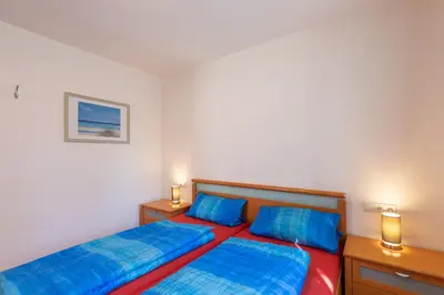 Ein Bett oder Betten in einem Zimmer der Unterkunft Haus Weser, Whg 2