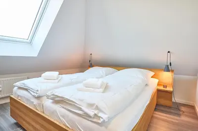 Ein Bett oder Betten in einem Zimmer der Unterkunft Oasis 07