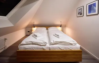 Ein Bett oder Betten in einem Zimmer der Unterkunft Oasis 07
