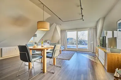 Ein Sitzbereich in der Unterkunft Oasis 07