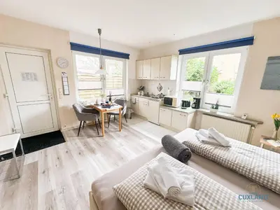 Ein Bett oder Betten in einem Zimmer der Unterkunft Ferienhaus Bungalow nahe Kurpark Döse