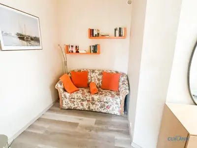 Ein Sitzbereich in der Unterkunft Ferienhaus Bungalow nahe Kurpark Döse