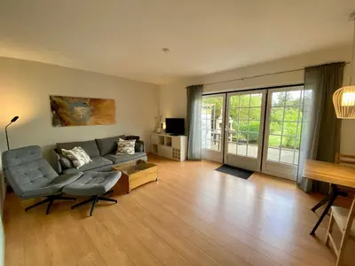 Ein Sitzbereich in der Unterkunft Ferienhaus Strandperle