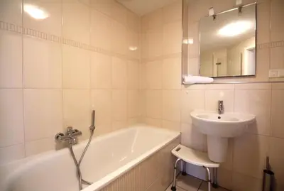 Ein Badezimmer in der Unterkunft Residenz am Yachthafen - Apartment mit Panoramablick