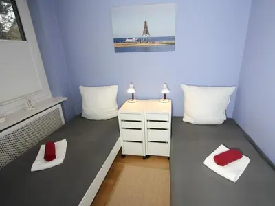 Ein Bett oder Betten in einem Zimmer der Unterkunft Residenz Haus Essen