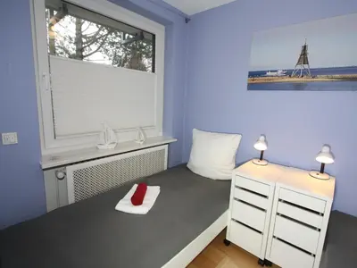 Ein Bett oder Betten in einem Zimmer der Unterkunft Residenz Haus Essen