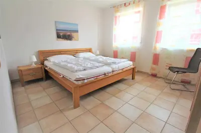 Ein Bett oder Betten in einem Zimmer der Unterkunft Residenz Villa am Strand