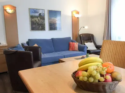 Ein Sitzbereich in der Unterkunft Residenz Kormoran 1 0