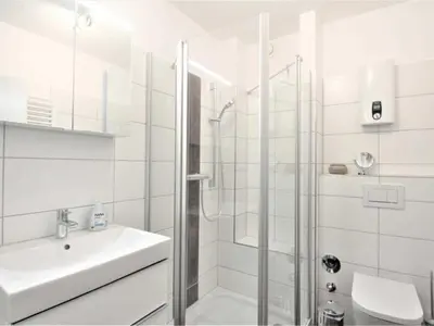 Ein Badezimmer in der Unterkunft Residenz Kormoran 1 0