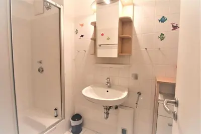 Ein Badezimmer in der Unterkunft Residenz Knechtsand 2